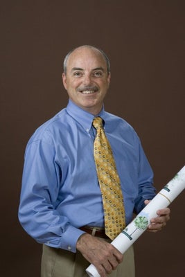 Portrait of Chris Carothers, Principal Broker, REALTOR®, CCIM, ALC